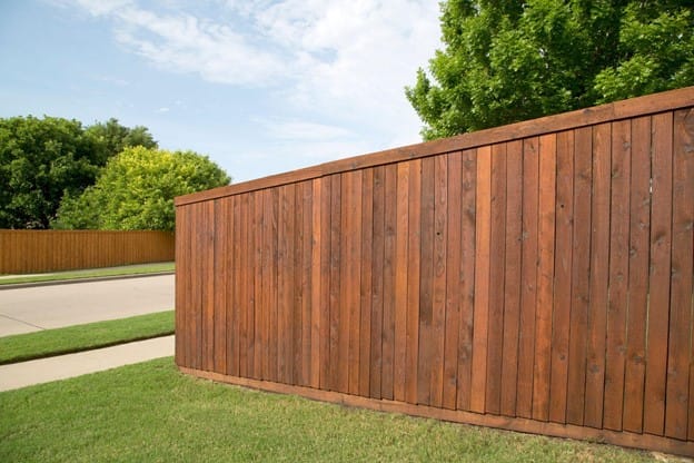 Outdoor Living 4 A Wooden Fence In A Yard